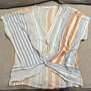 Stripe top with knot detail in front with a cute hemline